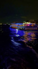 "Gliding through Bangkok's sparkling skyline on a cruise 🌃✨