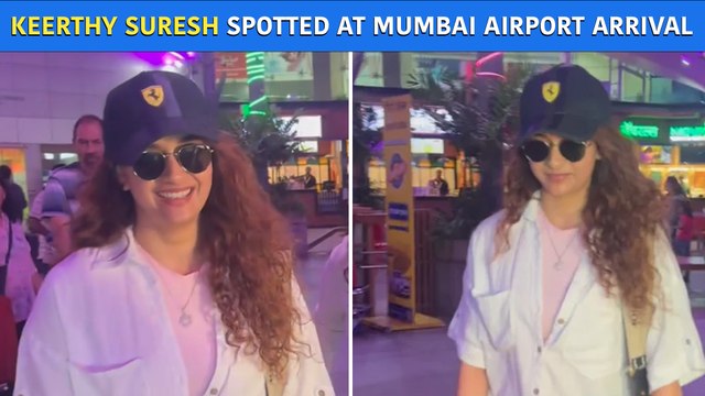 Actress Keerthy Suresh Slays In Curls, Cap & Classy Specs As She Arrives In Mumbai
