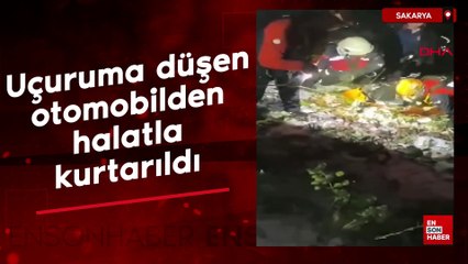 Sakarya'da uçuruma düşen otomobilde sıkışan sürücü halatla kurtarıldı