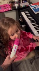 Little Girl Writes Her First Song and Performs it in Front of Her Family