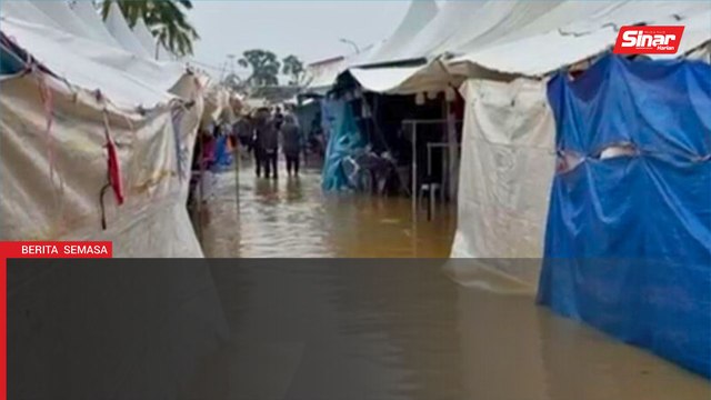 Peniaga tetap teruskan perniagaan walaupun khemah dinaiki air