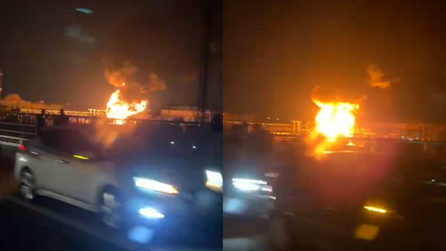 Drivers pull over to watch the substation fire near Heathrow airport