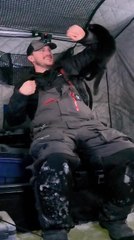 Man Finds Black Kitten on Remote Lake During Ice Fishing Trip