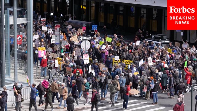 Anti-DOGE Protesters Demonstrate Outside Of Tesla Dealership In New York City