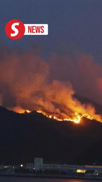 Residents evacuate as wildfires rage in southwestern Japan