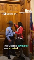 Georgia lawmaker arrested as governor signs new elections law