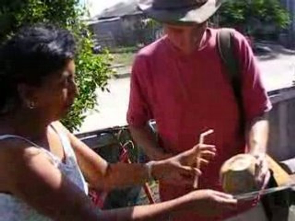Galapagos Islands: Opening a fresh coconut