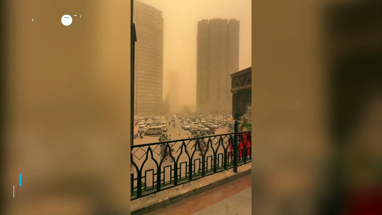 A massive sandstorm engulfs the city of Korla,...