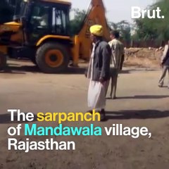 Woman Protests Encroachment Hanging From Excavator