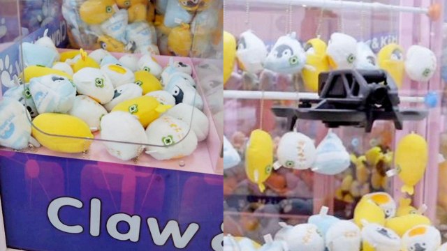 Man uses drone to win prizes from claw machine
