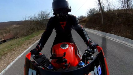 Biker fixates on a sharp turn and ends up veering off the road