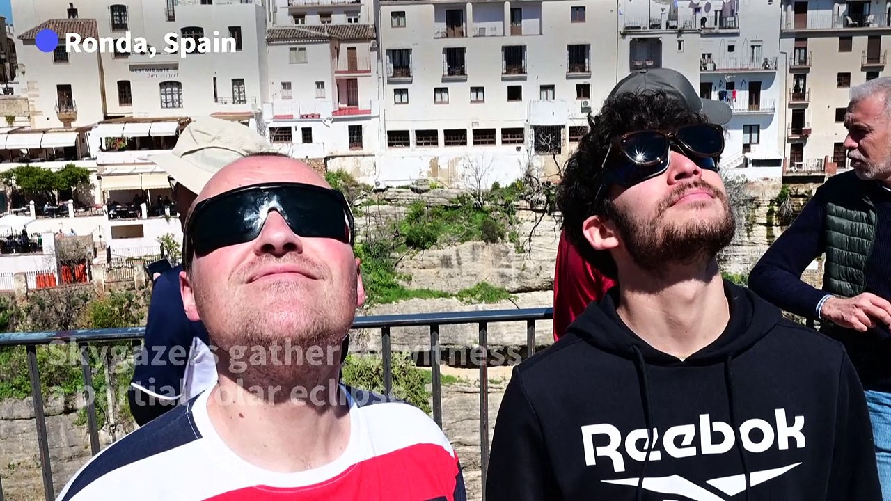 People gather to witness partial solar eclipse in Spanish town of Ronda