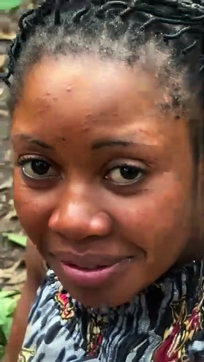 Constructing a fence . Karamoja village life