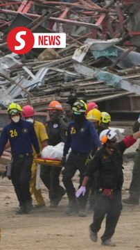 More bodies pulled from collapsed Bangkok building as death toll hits at least 18