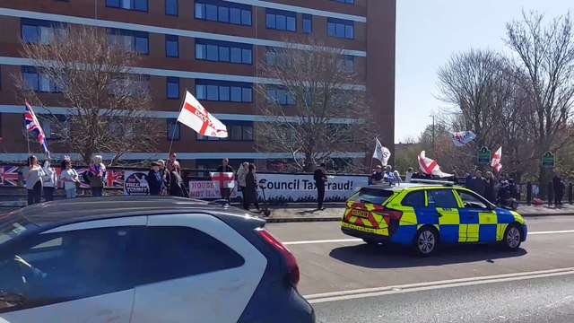 Anti-illegal immigration protestors gather outside Roebuck House in Cosham