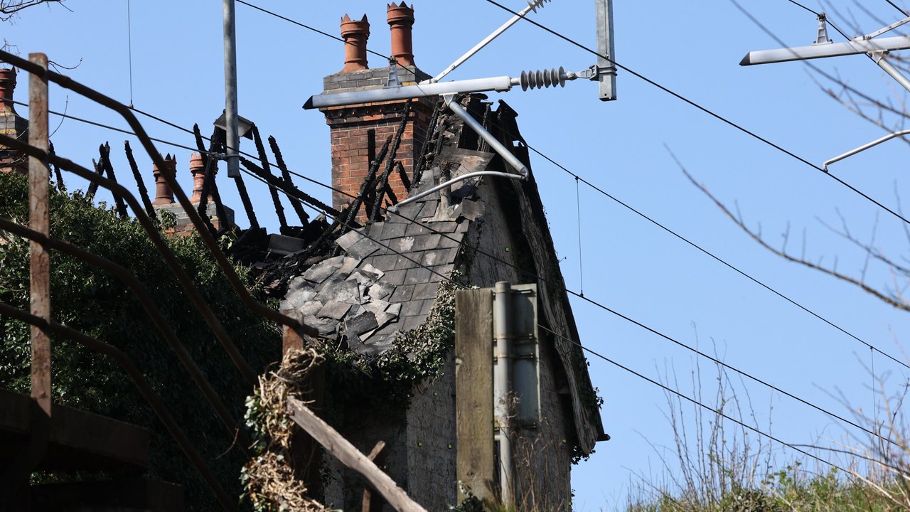 Aftermath of huge blaze that killed three members of "blended family"