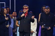 Sir Elton John did not want kids to 'grow up in fear'