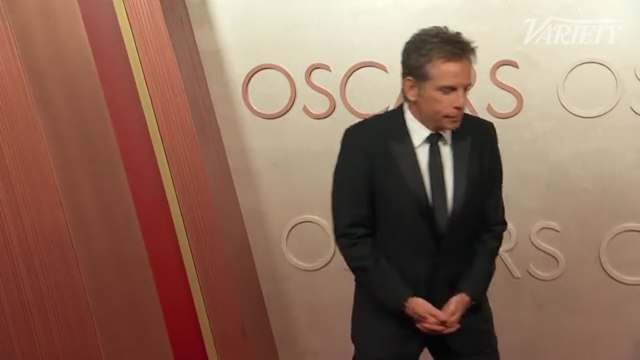Ben Stiller takes photos on the Oscars red carpet