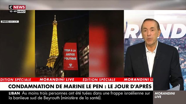 Marine Le Pen - Enquête sur le happening hier soir au pied de la Tour Eiffel dans Morandini Live : Qui a organisé la projection de cette affiche Stop à la justice politique ? - VIDEO