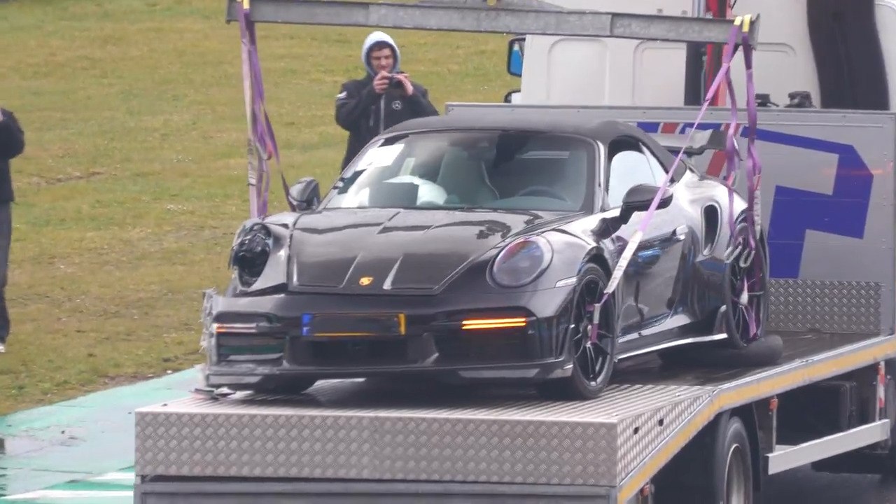 Black Porsche Crashes Into Wall