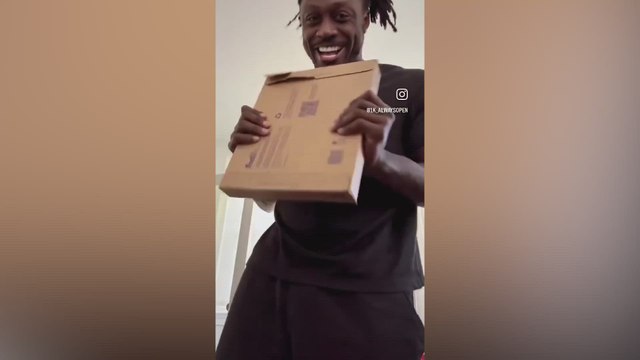 A.J. Brown explodes with joy after receiving signed jersey from Tom Brady