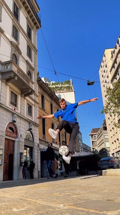 Guy Performs Cool Soccer Dribbles on Random Street in Milan