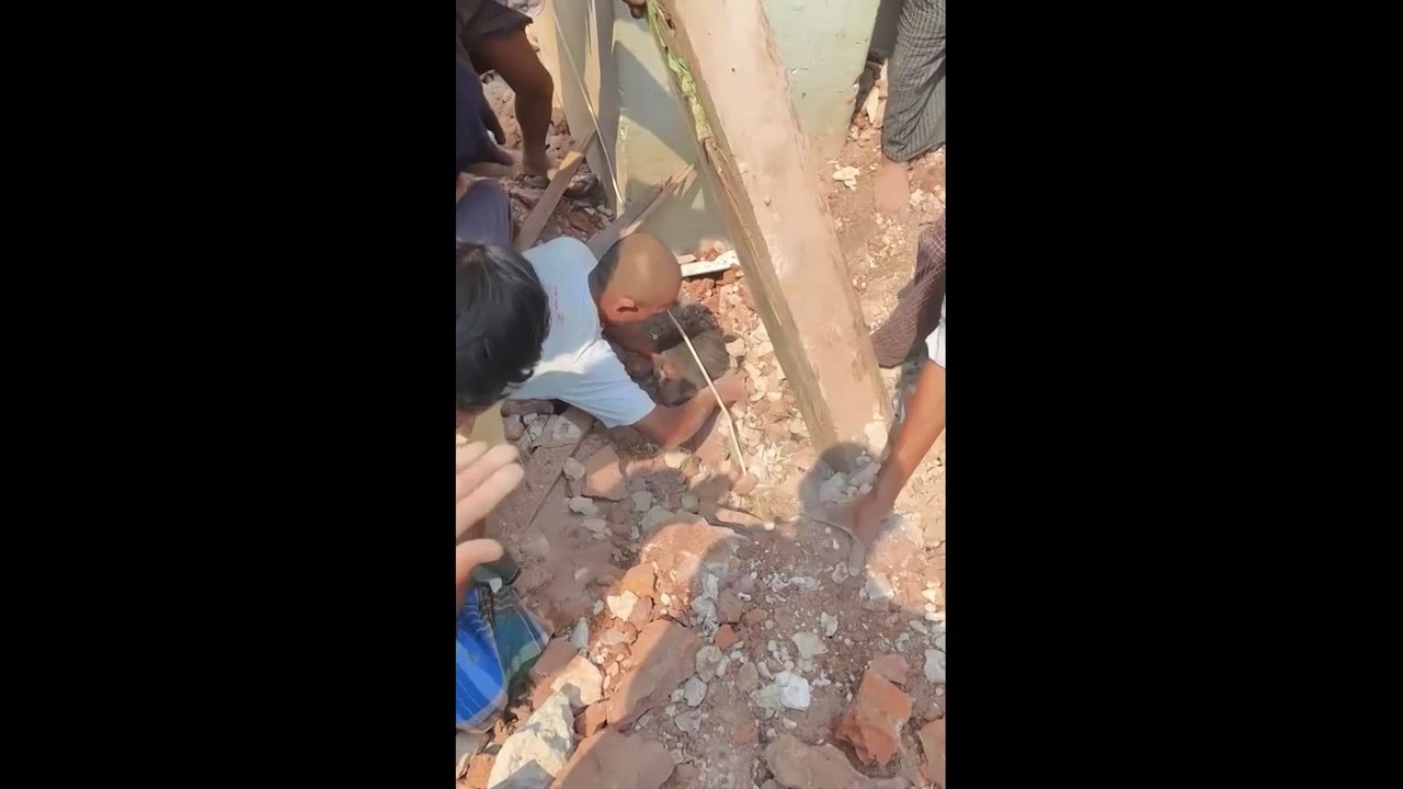 Young girl rescued from monastery collapse in Myanmar quake