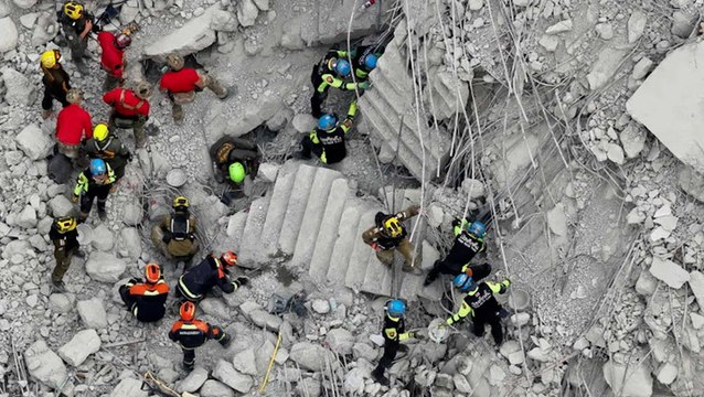 Survivors heard at Bangkok building collapse site as rescuers use megaphone in search