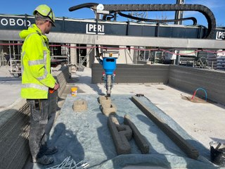 Un immeuble construit à l'imprimante 3D