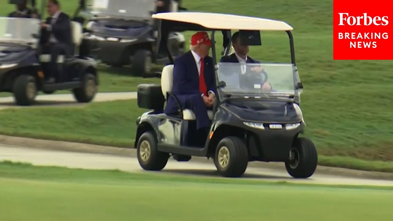 Trump Hops In A Golf Cart Upon Arrival To Doral Golf Club Where LIV Event Held