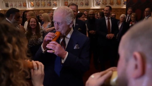 Watch moment King Charles plays recorder made from carrot at Windsor castle reception