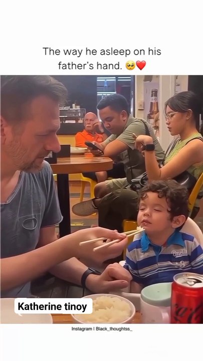 The way he asleep on his father's hand.