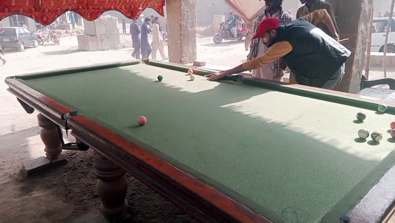 Playing Snooker
