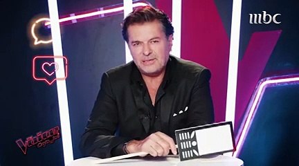 بعد استفزازه لها.. معجبة تقتحم مكتب راغب علامة وتحطم هاتفه