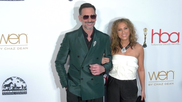 Lawrence Zarian and Jennifer Dorogi attend the 10th annual Hollywood Beauty Awards red carpet