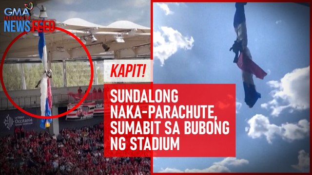Kapit! Sundalong naka-parachute, sumabit sa bubong ng stadium | GMA Integrated Newsfeed