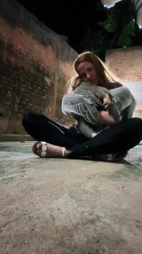 Woman Showers Her Goose With Love Through Hugs and Kisses