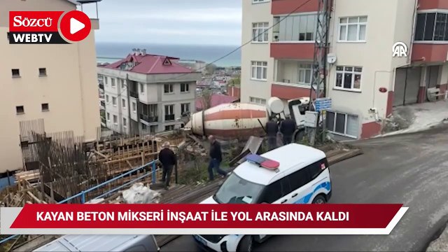 Yokuştan kayan beton mikseri inşaat ile yol arasında asılı kaldı