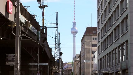 Berlin Fernsehturm Towering Over Skyline
