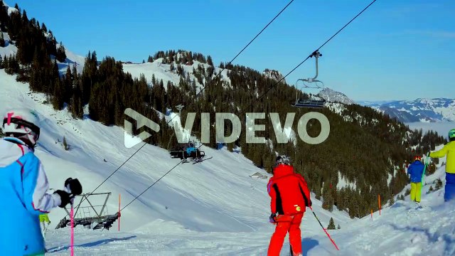 ski area in the Swiss alps with people and chairlifts in the winter ski area of Beckenried