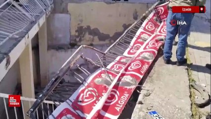 İzmir'de virajı alamayan otomobil, apartman boşluğuna uçtu