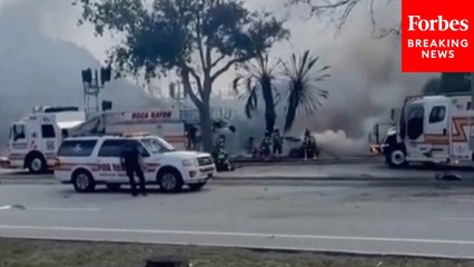 First Responders Battle Flames After Deadly Small Plane Crash In Boca Raton, Florida