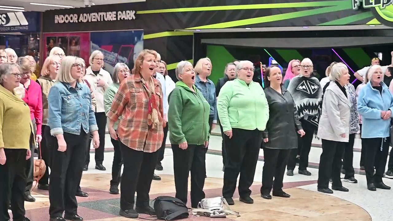 The Rock Choir Flash Mobs Telford Shopping Centre for Parkinsons UK.