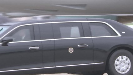 Trump Battles Torrential Downpour on His Way to Air Force One