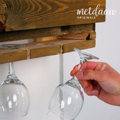 Converting a wooden pallet into a wine display rack