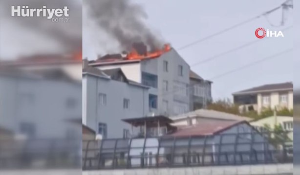 Başakşehir'de 4 katlı binanın çatı katında yangın