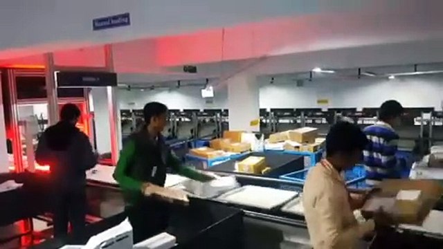 Parcel sorter Induction Systems_ for controlled high speed feeding into Sorter System