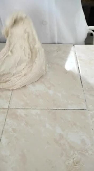 Person Accidentally Breaks Tiles of Their Kitchen Counter While Kneading Dough