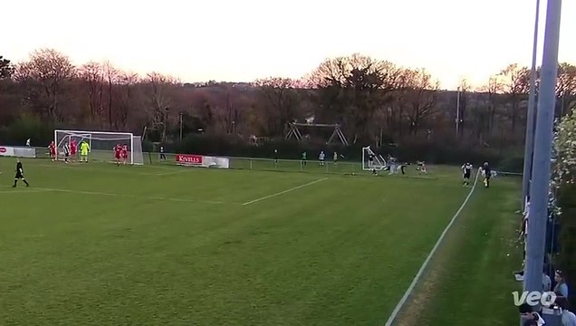 Ollie Moores heads in Holsworthy's winning goal against Bude Town on Friday night.