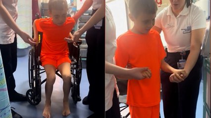 Boy takes first steps after emergency brain surgery following road traffic accident